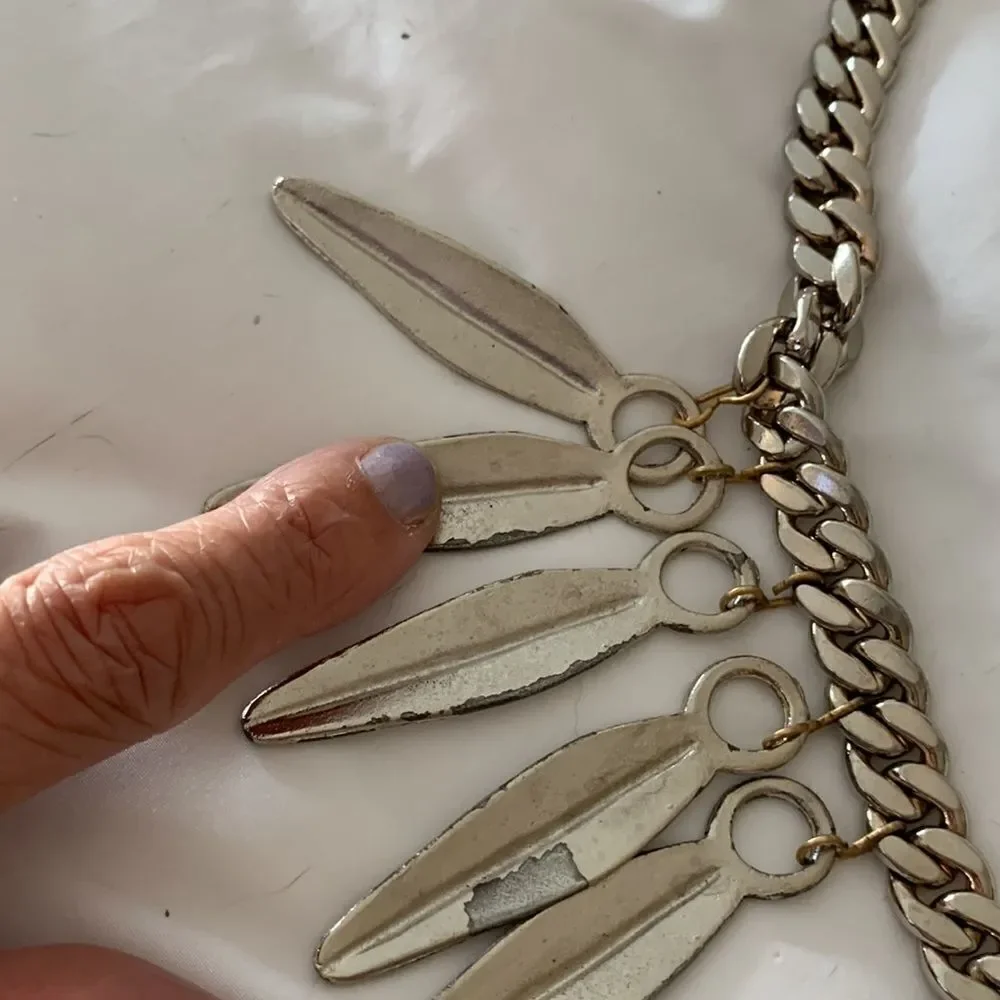 YSL silver chain link belt leaf design